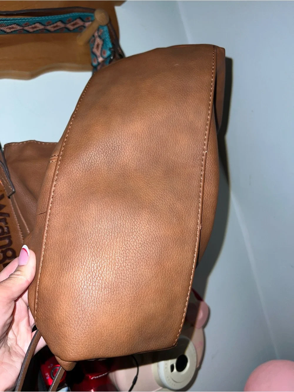 Stylish Brown Leather Shoulder Bag with Patterned Straps